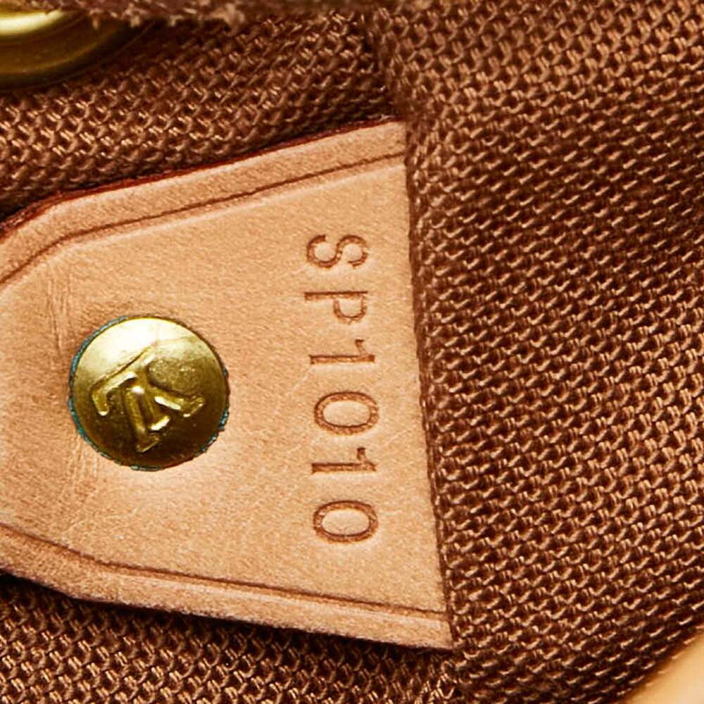 LOUIS VUITTON Authentic Brown Monogram Leather Backpack - Picture 14 of 14